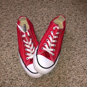 Women’s red low top chuck taylor covers